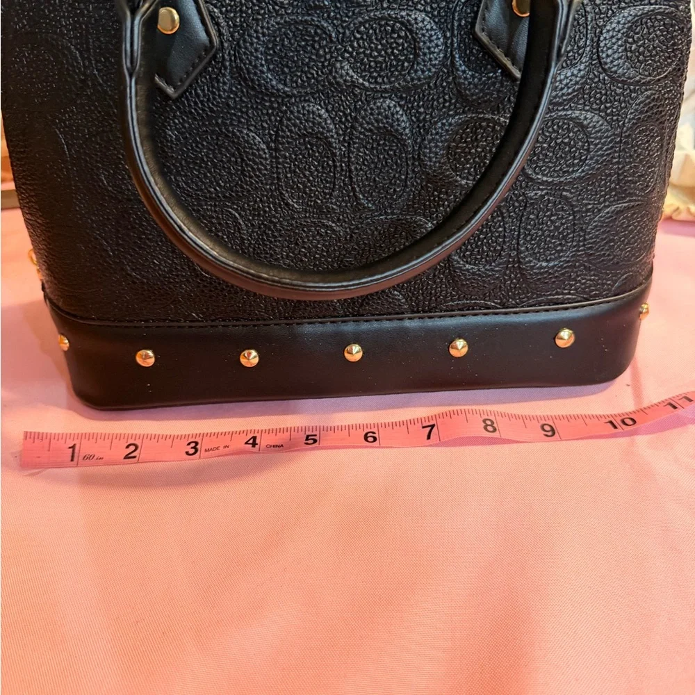 Elegant‎ Black Handbag with Gold Accents